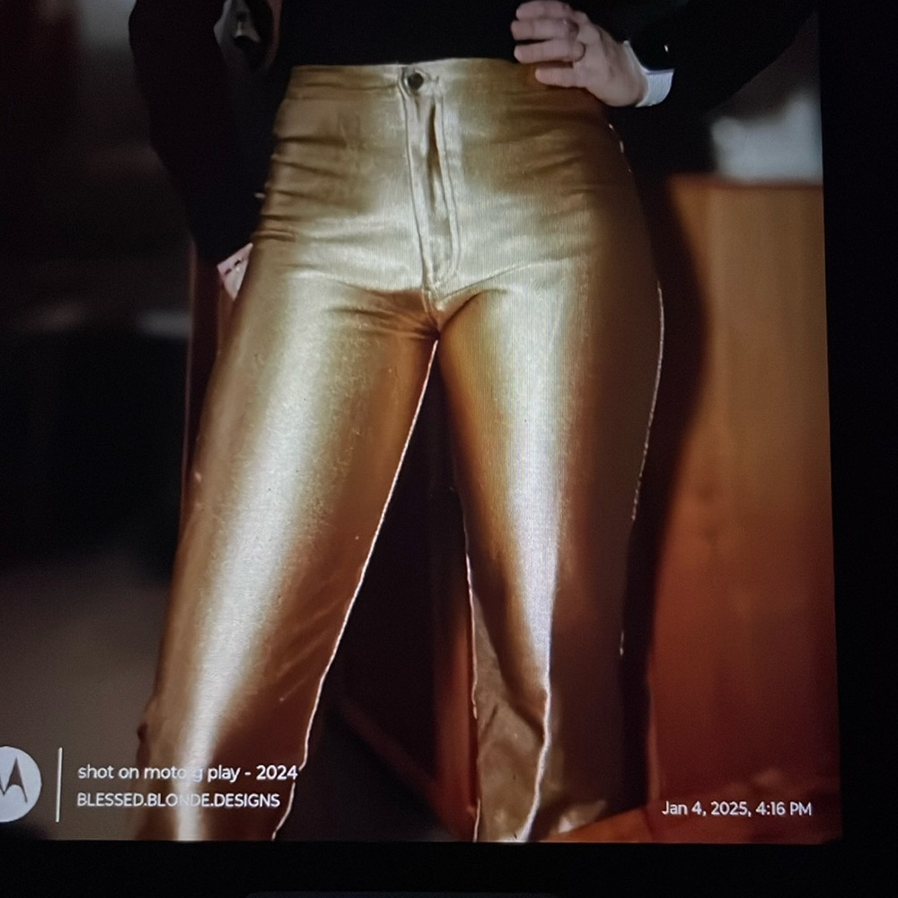 Fredrick’s of Hollywood Gold “ hot pants” size small. Vintage Disco!